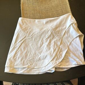 Lululemon size 8 skirt asymmetrical. White